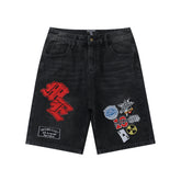 MIXED EMOTION MULTI‑PATCH BLACK WASH BAGGY DENIM SHORTS