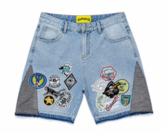 Godspeed Multi‑Patchwork Badge Light Wash Denim Jort Shorts