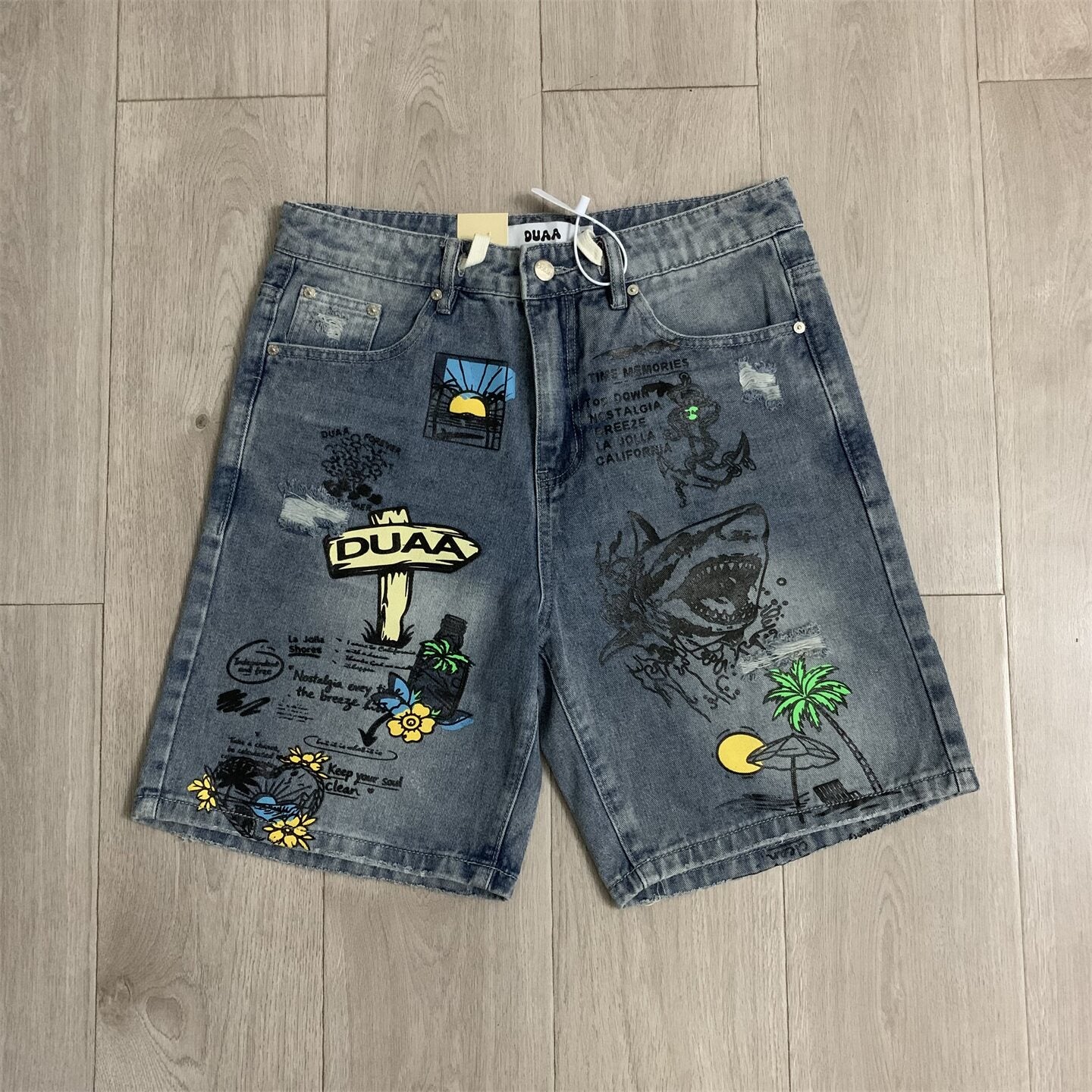 Duaa Vintage Graffiti Print Distressed Denim Jort Shorts