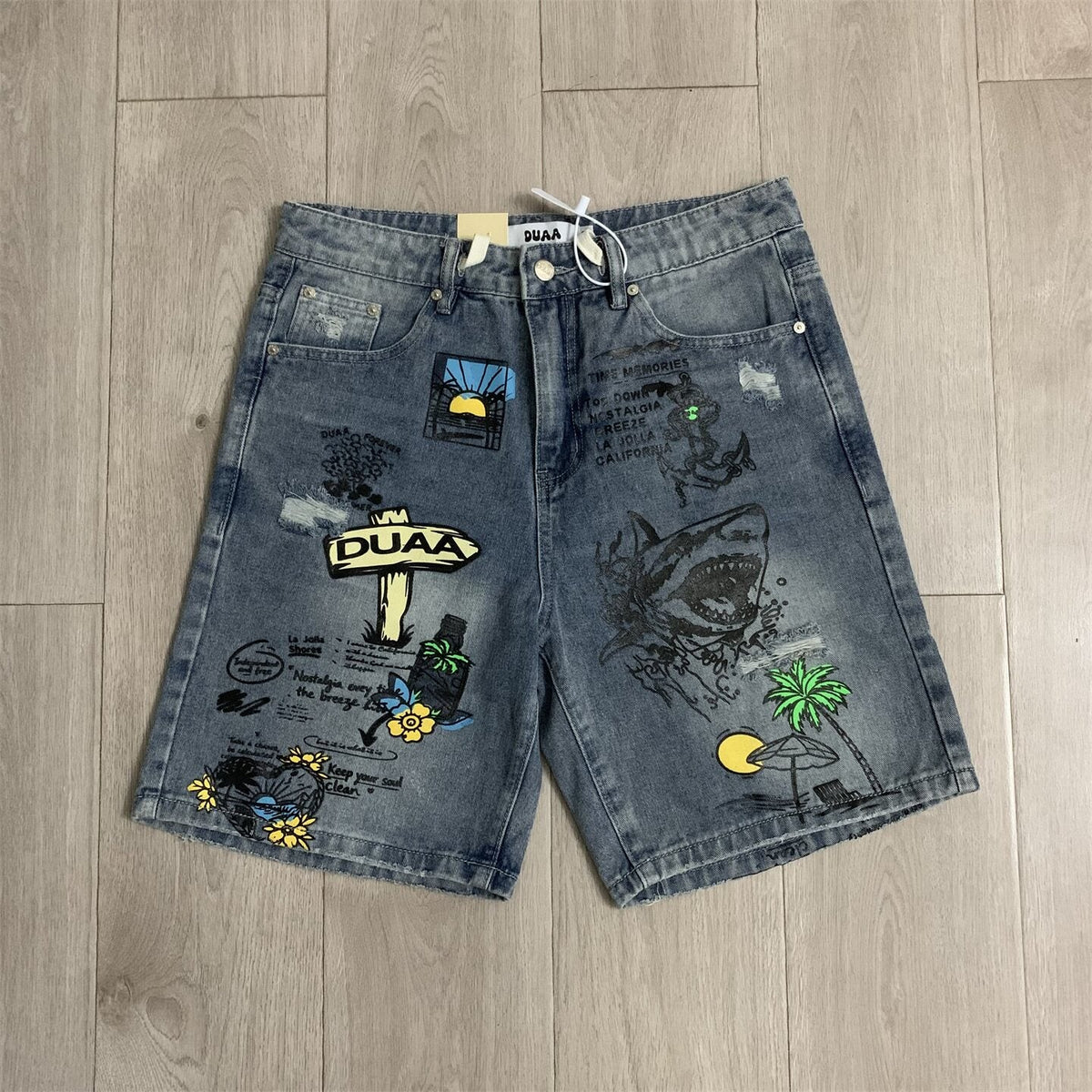 Duaa Vintage Graffiti Print Distressed Denim Jort Shorts