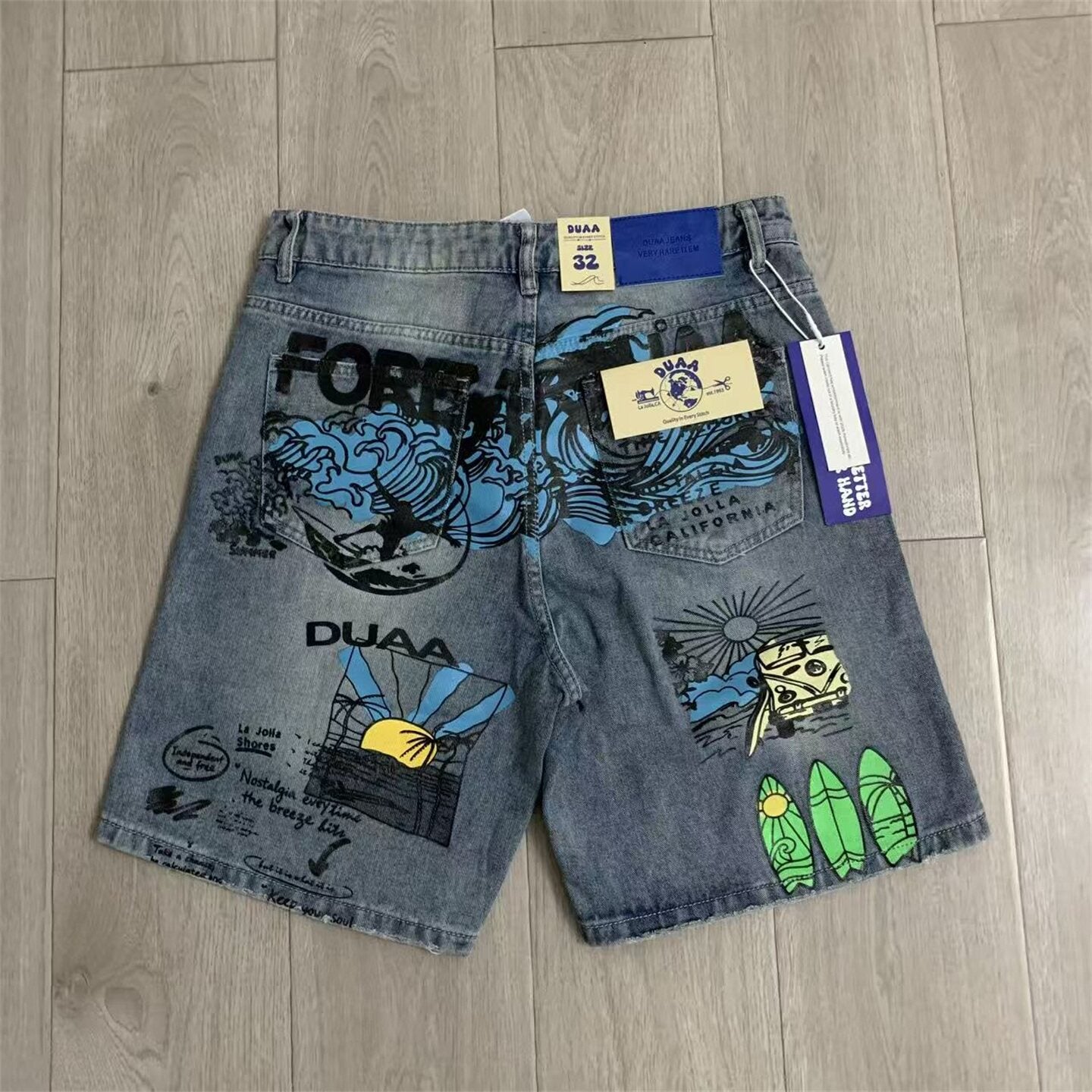 Duaa Vintage Graffiti Print Distressed Denim Jort Shorts