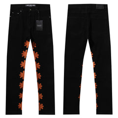 LOST SHDWS BLACK DENIM BROWN FLORAL APPLIQUE STACKED FLARE JEANS