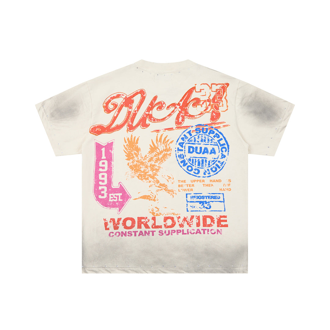 DUAA WORLDWIDE EST 1993 EAGLE STAMP RHINESTONE VINTAGE WASH T‑SHIRT