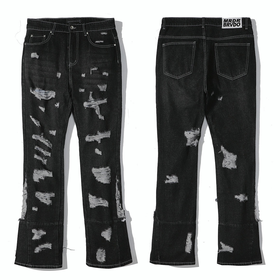 Who Decides War All‑Over Ripped Black Stacked Flare Jeans